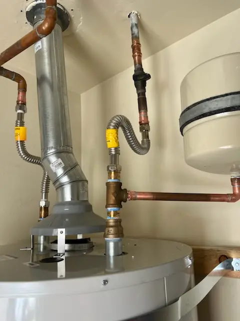 Water heater installation and plumbing repair in Greenfield Village